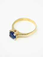 Lady's ring, solitaire blue stone